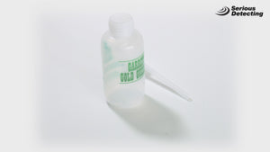 Garrett  Gold Guzzler Bottle for prospection with product title printed on a clear plastic bottle with pipper on the side spinning around