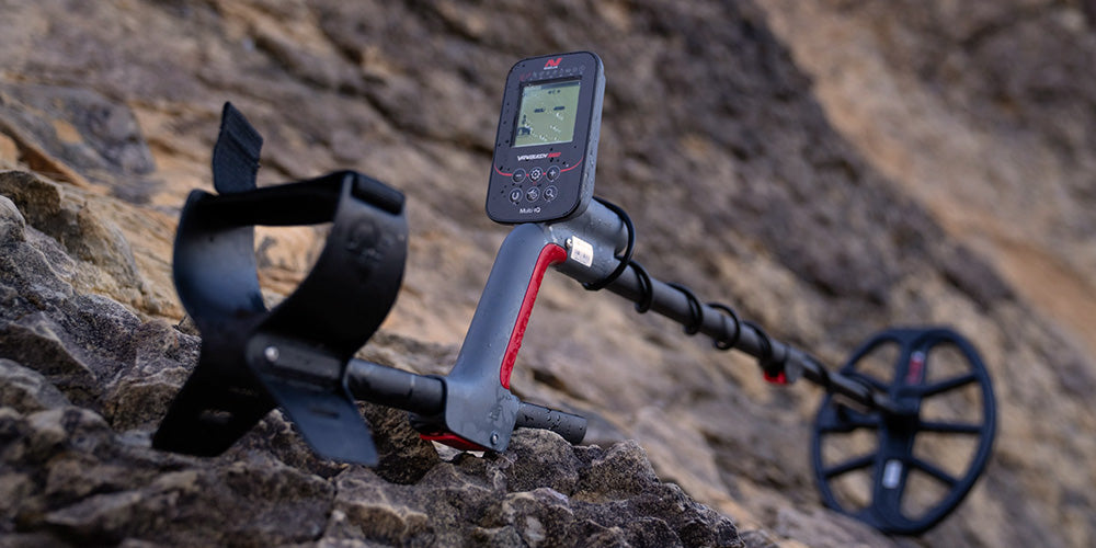 Minelab Vanquish 540 metal detector on rocky terrain