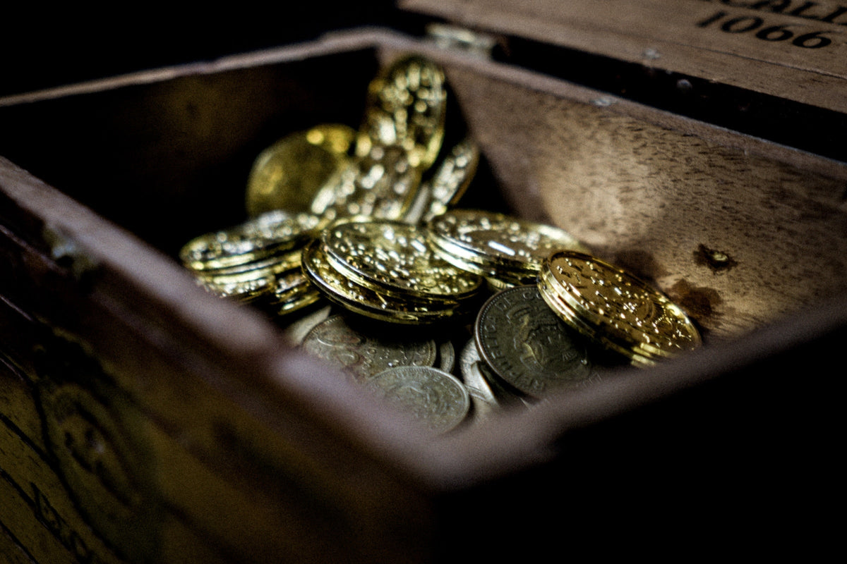 https://unsplash.com/photos/a-wooden-box-filled-with-lots-of-coins--clf0K7plGM?utm_content=creditShareLink&utm_medium=referral&utm_source=unsplash