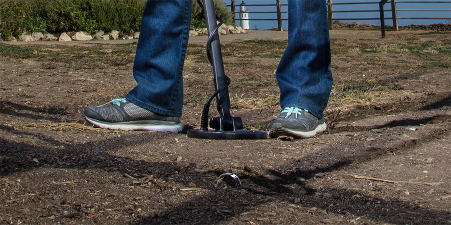 Testing whether a titanium object sets off a metal detector