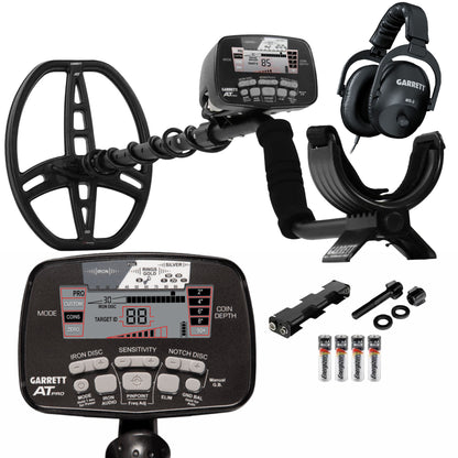 Black Garrett AT Pro metal detector with accessories on white background