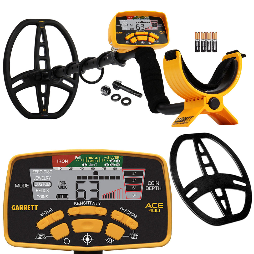 Black and yellow Garrett ACE 400 metal detector with coil cover, hardware, control box, and batteries on white background.