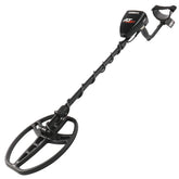 A black Garrett AT-6100 metal detector with a spiral coil, walk-through guard, and ergonomic handle, shown on a solid white background.