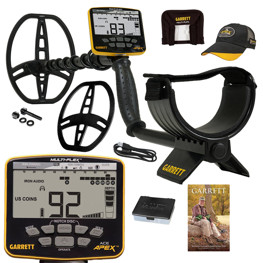 Garrett metal detector kit with a black and yellow Multi-Flex coil, digital control unit, carrying case, cap, accessories, and a booklet on a white background.