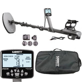 Garrett Axiom metal detector set with a gray and black coil, digital control display, four ground wall adapters, a USB cable, and a black zippered carrying case on a white background.
