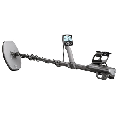 A handheld metal detector with a large circular coil, long shaft, digital display screen, and armrest, shown against a plain white background.