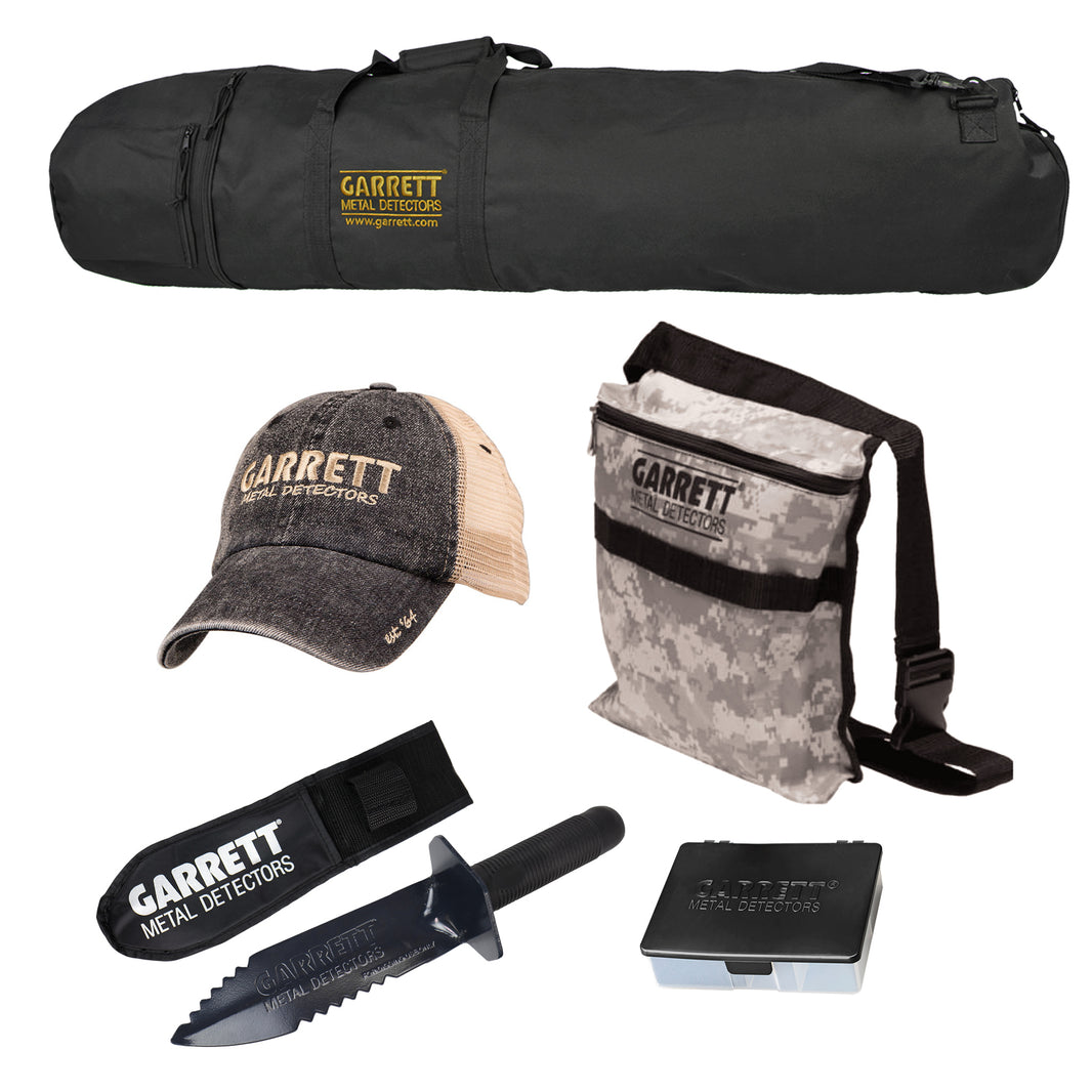 Garrett Diggers Kit featuring black carry bag, hat, camo pouch, digger with sheath, and keeper box.