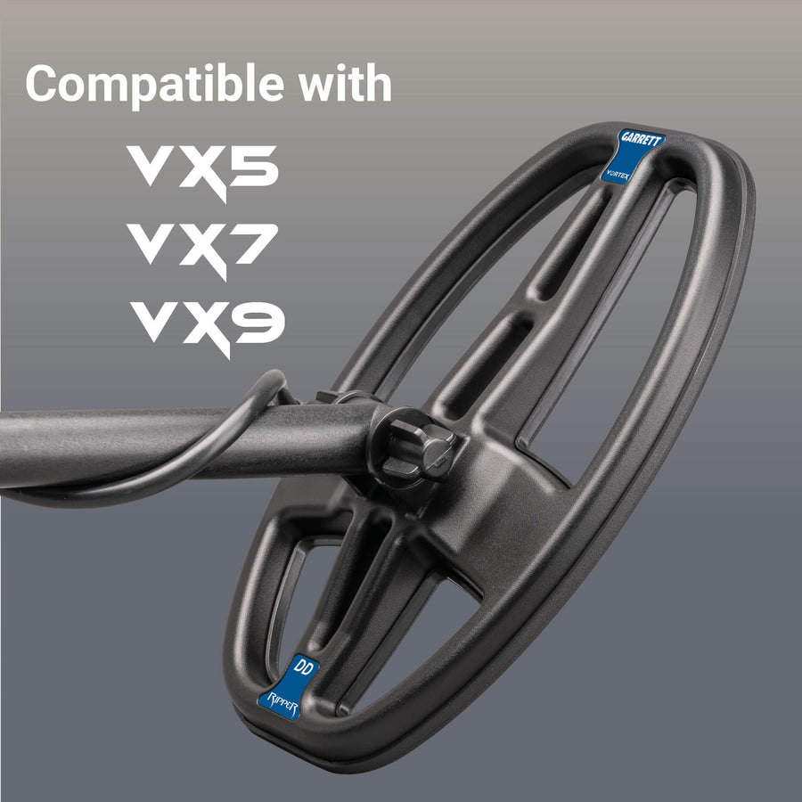 Black metal detecting coil with compatibility text for VX5, VX7, and VX9 models on a dark gray background.
