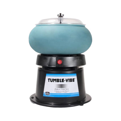 A Raytech Tumble-Vibe ceramic tumbling machine with a light blue-green bowl on a black base, featuring a clear lid and a front label.