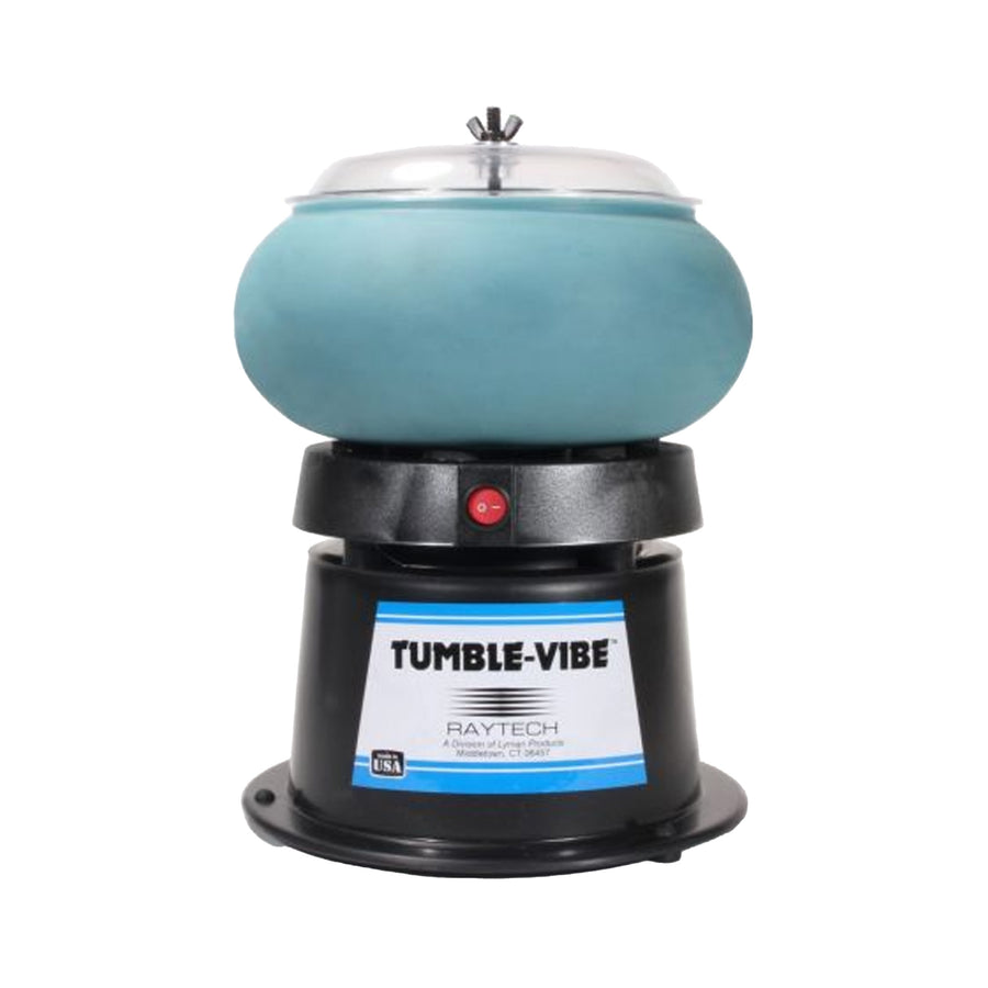A Raytech Tumble-Vibe ceramic tumbling machine with a light blue-green bowl on a black base, featuring a clear lid and a front label.