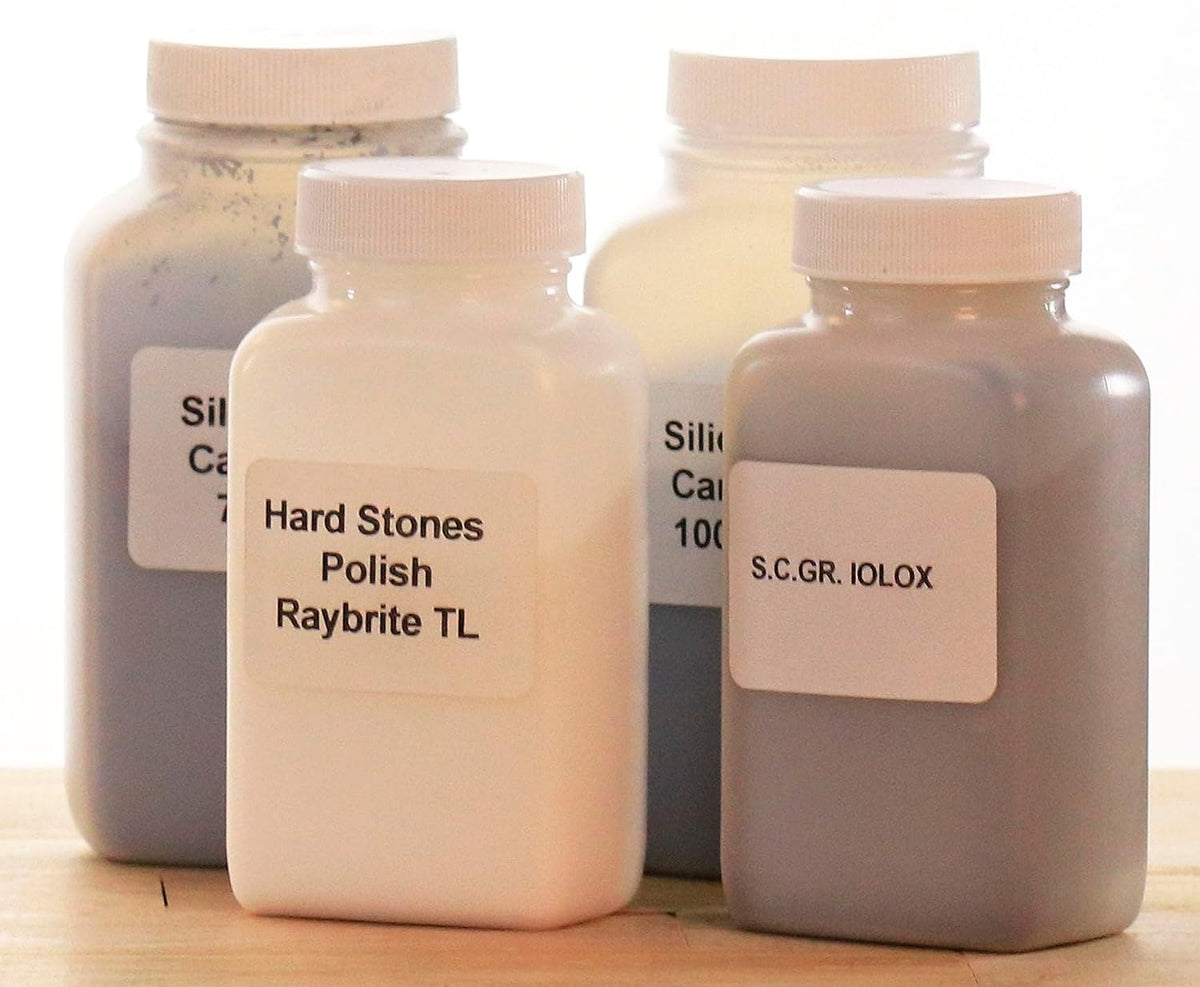 Four bottles of polishing grit included with the Raytech Tumble-Vibe 10 rock polisher