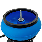 A close-up of a blue tumbling bowl with a black rim and a central metal threaded post on a white background.