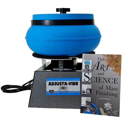 A Raytech Adjusta-Vibe (Ultimate Polisher) mass finisher machine with a blue rotating bowl and a textured gray base, shown alongside a book titled 'The Art and Science of Mass Finishing' by Sam Thompson on a white background.