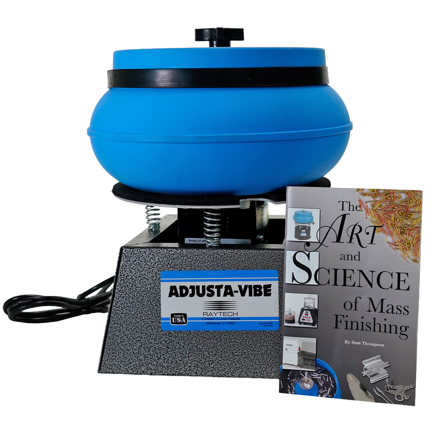 A Raytech Adjusta-Vibe (Ultimate Polisher) mass finisher machine with a blue rotating bowl and a textured gray base, shown alongside a book titled 'The Art and Science of Mass Finishing' by Sam Thompson on a white background.