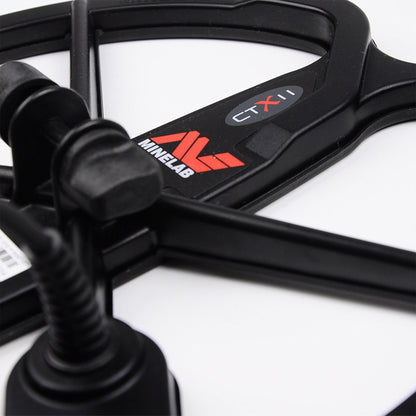 Close-up of the Minelab CTX 3030 11 inch coil mounting clamp and CTX 11  with the Red Minelab Logo