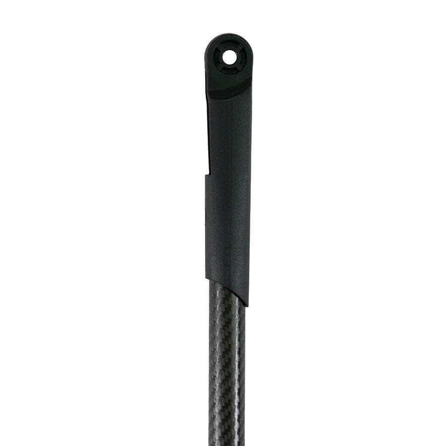 Black carbon fiber rod on a white background end view