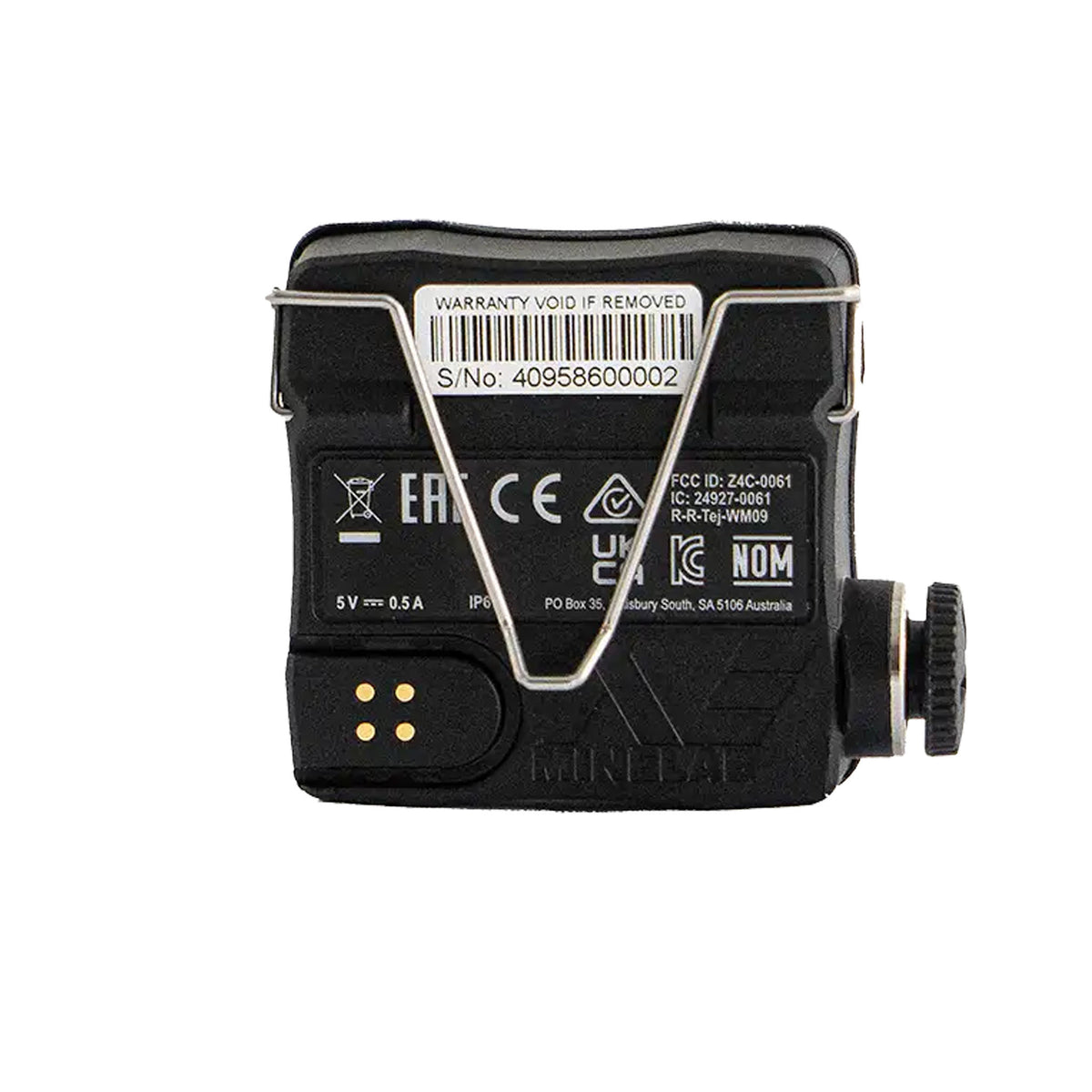 The back of the Minelab WM 09 wireless audio module for Equinox and Manticore detectors shows the headphone jack, built-in belt clip and magnetic charging port 