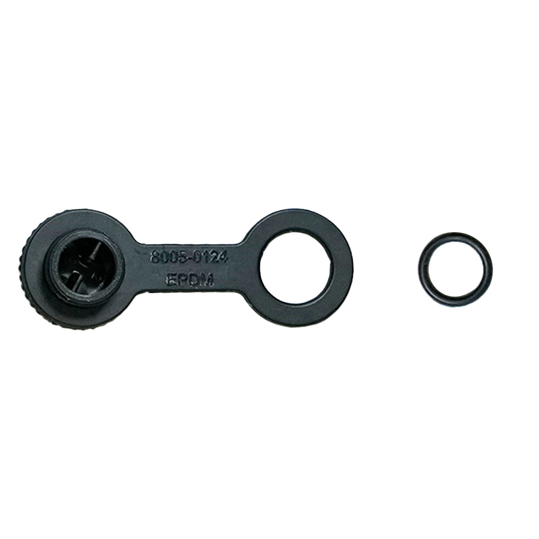 A black plastic cap with tether and a separate small O-ring to the right, shown on a plain white background.