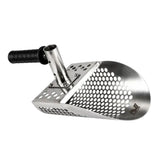 A stainless steel sand scoop with a perforated scoop blade, a mounting bracket, and a black textured handle, shown on a plain white background.