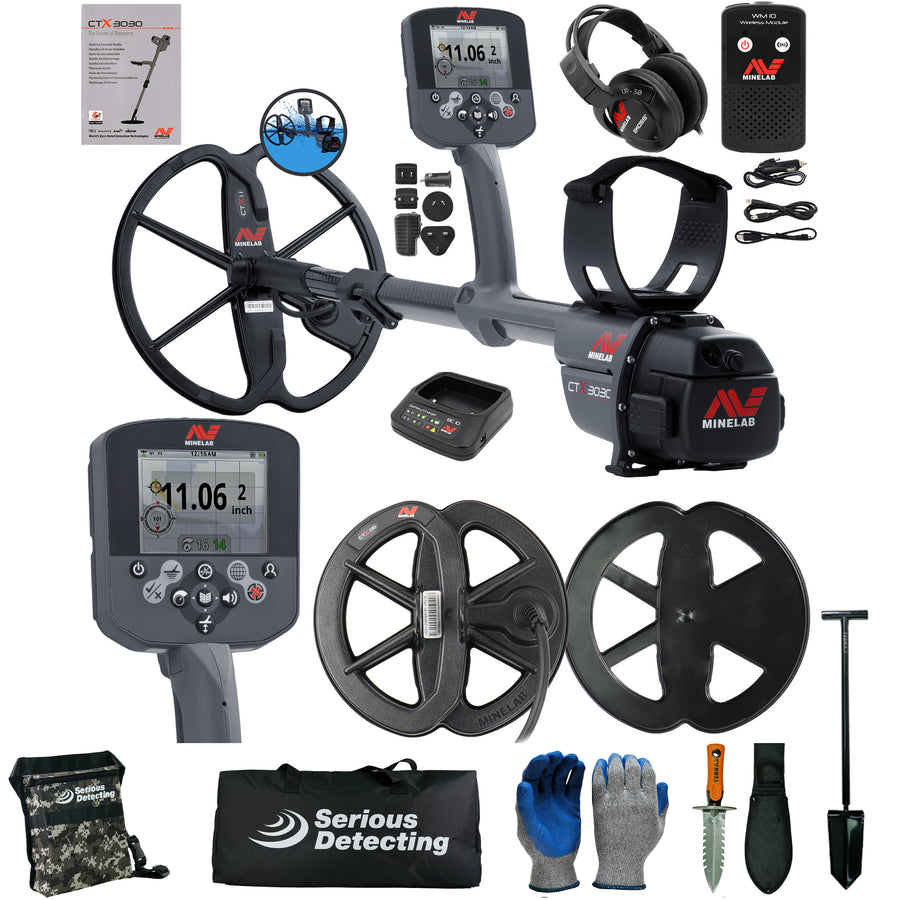 A metal detector kit laid out on a white background, including a gray Minelab CTR-8000 metal detector with two coils, two control boxes, headphones, battery, cables, gloves, a shovel, a digging knife, a bag, and accessories. The Minelab brand is clearly visible on multiple items.