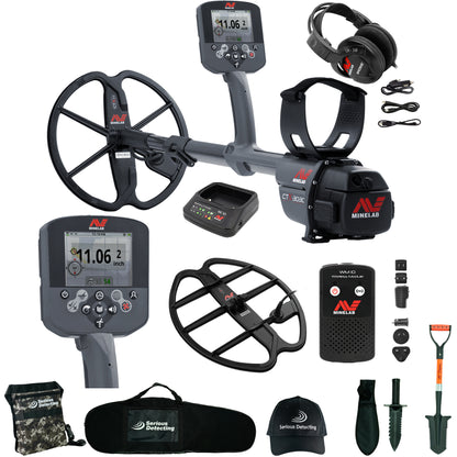 gray and black metal detector with accessories and serious detecting kit on white background