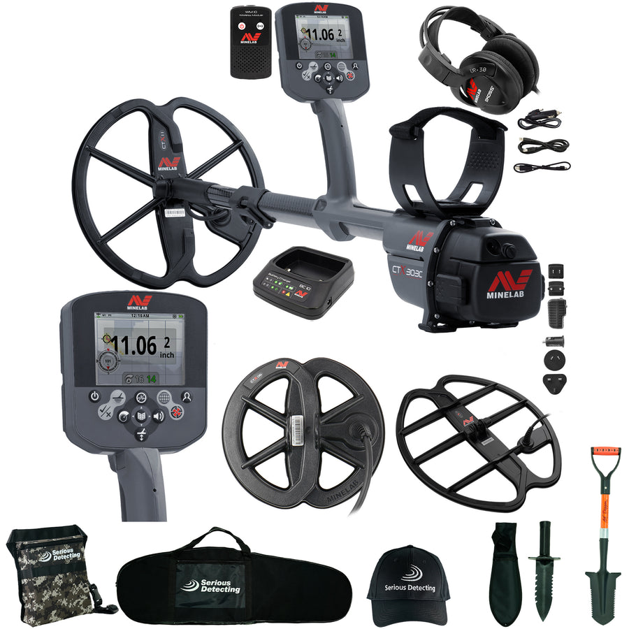 A metal detector bundle on a white background, including a gray and black Minelab metal detector with multiple accessories such as headphones, a battery, charger, coils, tools, carrying bag, cap, and shovel.