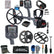 A metal detector kit laid out on a white background, including a gray and black metal detector with two coils, two handheld controllers, a pair of headphones, a battery charger, spare batteries, a carrying bag, gloves, a digging knife, a shovel, and other accessories. The detector and accessories show the NME / Serious Detecting branding.