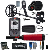 A metal detector kit laid out on a white background, including a black wireless metal detector with a digital display, headphones, carrying case, handheld pinpointer with red grip, gloves, shovel,  and other accessories. The brand name 'Serious Detecting' is visible on several items.