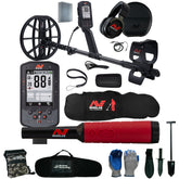 A Minelab metal detector kit laid out on a white background, including a black and red digital detector, headphones, carrying cases, gloves, shovel, and other accessories.