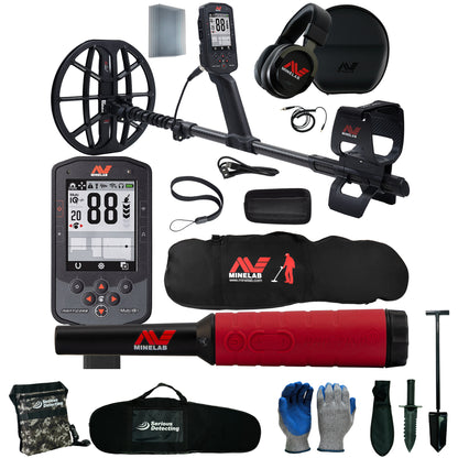 A Minelab metal detector kit laid out on a white background, including a black and red digital detector, headphones, carrying cases, gloves, shovel, and other accessories.