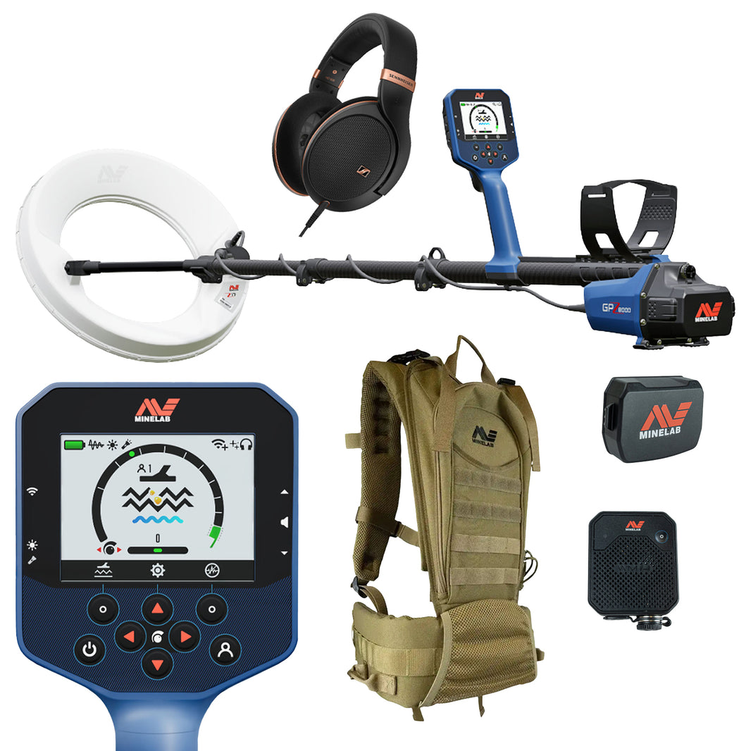 A metal detector bundle by Minelab on a white background, including a white circular coil, a blue-and-black controller box, a pair of black over-ear headphones, a tan harness, two black battery packs, and a black speaker.