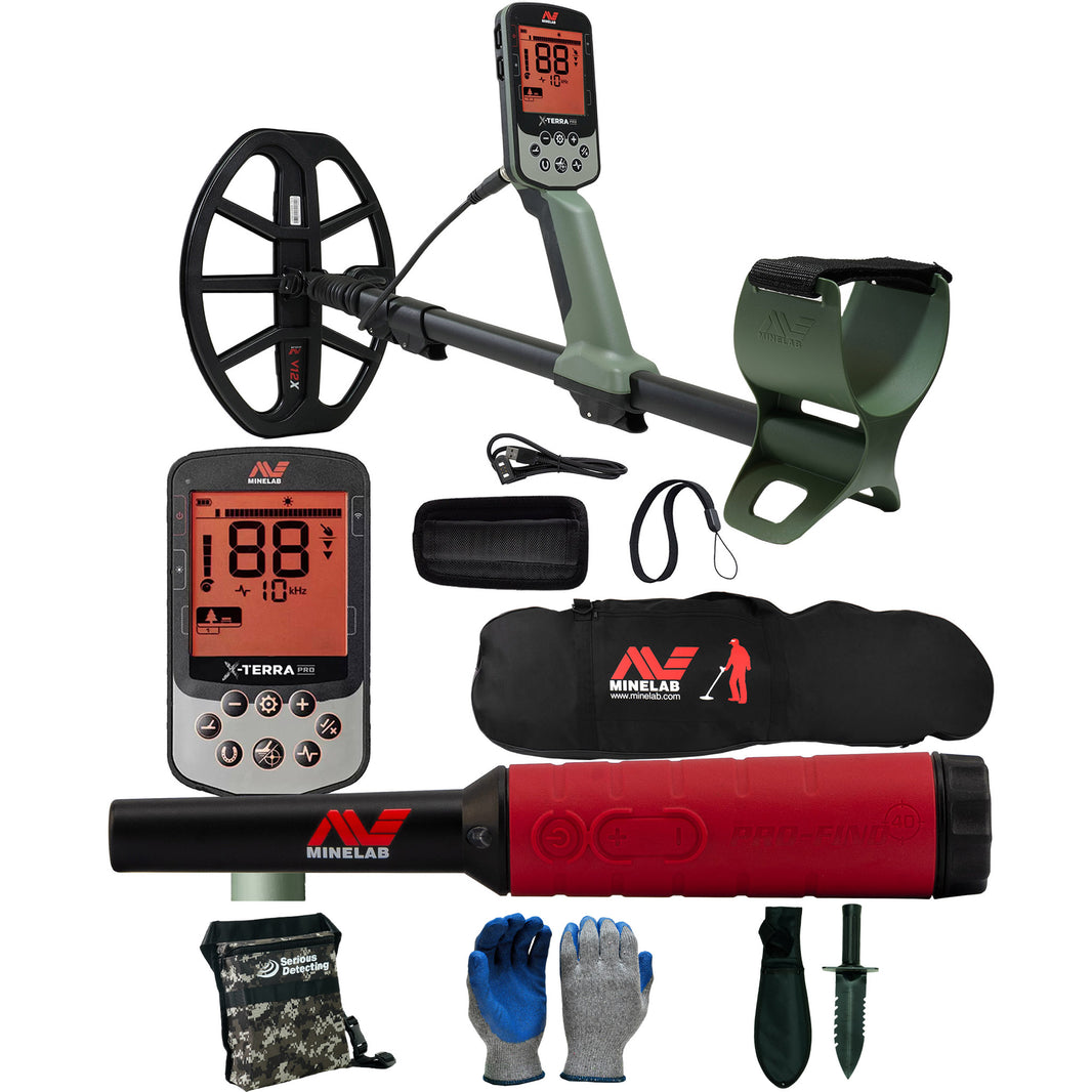 A Minelab metal detector kit with a green and black control box, a large black detector coil, a red-and-black handheld wand, a black carrying case, gloves, a small pouch, and accessories, all arranged on a white background.