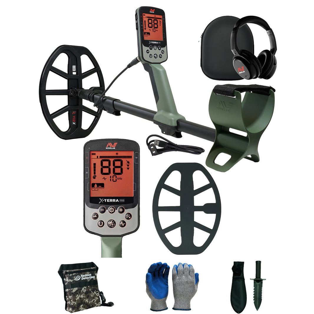green and black metal detector with accessories on a white background