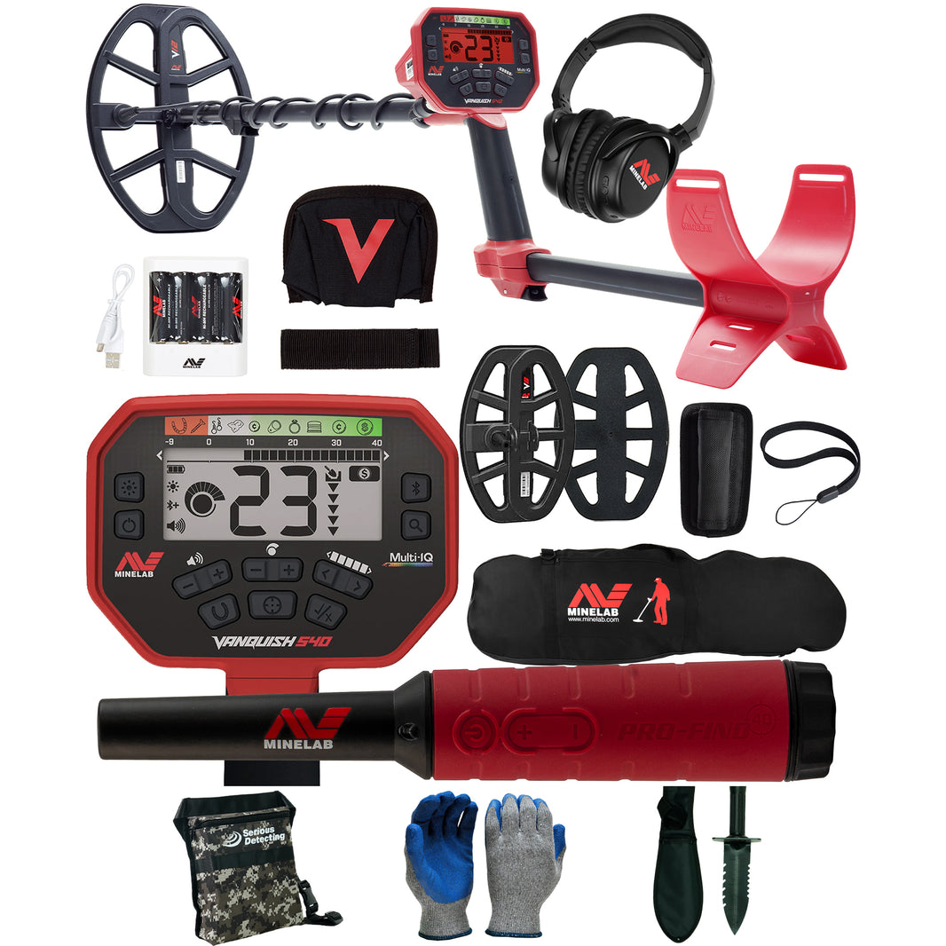 A Minelab metal detector set displayed on a white background, including a red and black Vanquish Pro handheld detector, a black coil, a pair of black headphones, a red armrest, black coil with cover, a battery charger, batteries, a strap, rain cover, gloves, boots, and accessories on a white background.