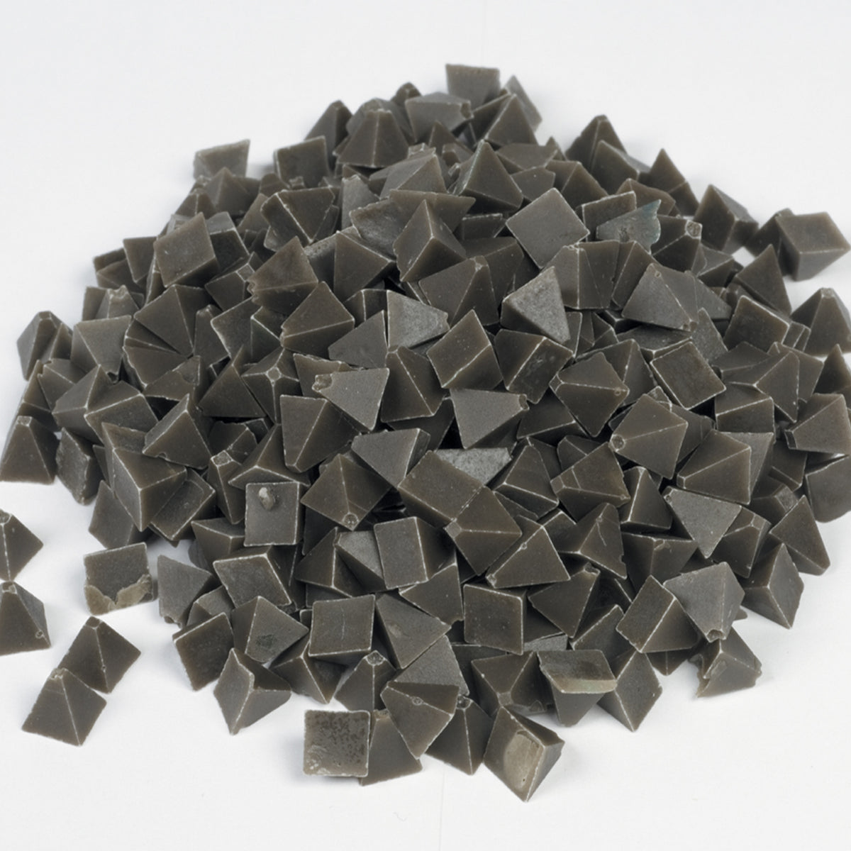 Close-up view of Raytech pyramid media demonstrating sharp angular cutting edges