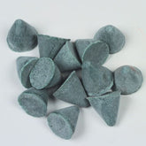 Raytech 9/16 inch XF plastic cone tumbling media close-up showing texture and shape