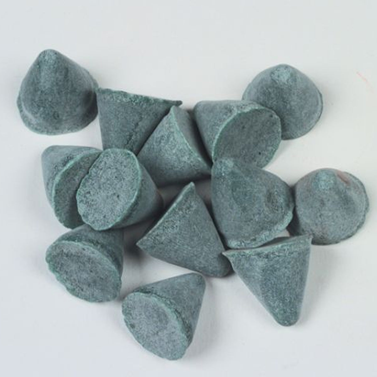 Raytech 9/16 inch XF plastic cone tumbling media close-up showing texture and shape