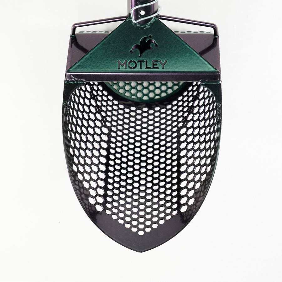The Motley Beach Scoop is shown in chameleon for beach metal detecting.