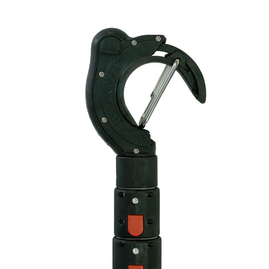 Hook & Moor telescoping boat hook floating on water surface demonstrating built-in buoyancy chamber