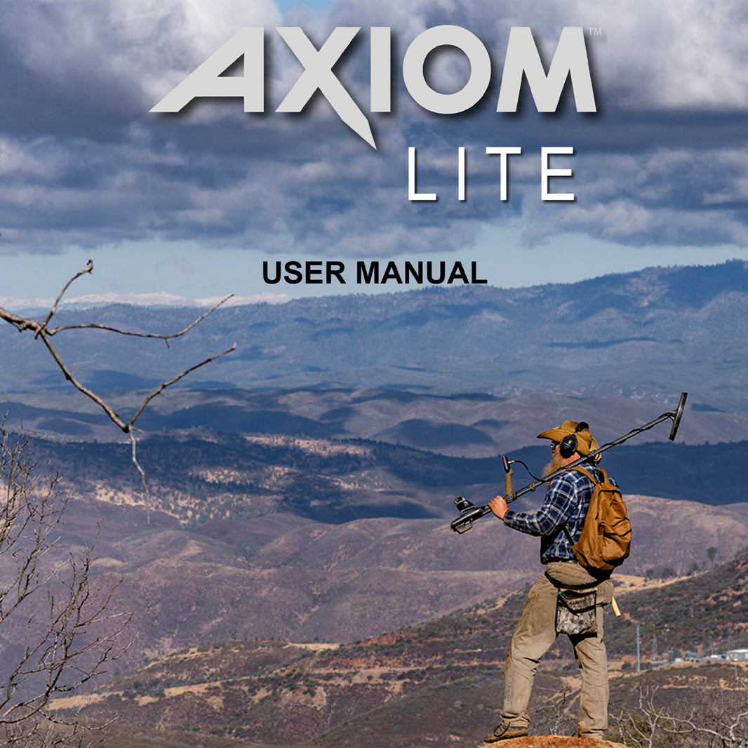 Axiom Lite User Manual cover featuring a man with a metal detector standing on a mountain ridge with a vast mountain range and cloudy sky in the background.