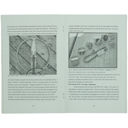 An open book showing two interior pages with printed text and two black-and-white photographs. The pages are photographed against a neutral light background.