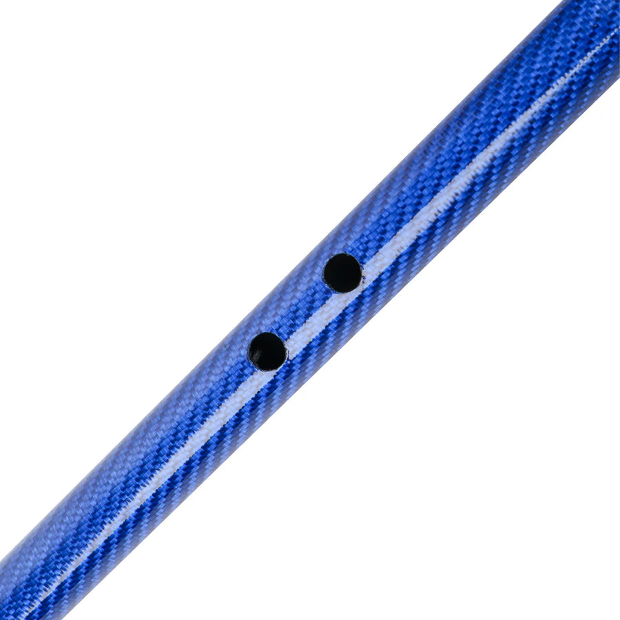 Close-up of a blue textured rod with two black dots on a white background