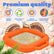 An orange inflatable sand shifter with integrated handles, shown filled with sand and surrounded by seashells on a light beige background. The image includes marketing text reading 'Premium quality' and four feature icons for unique design, high quality plastic, simple construction, and comfortable hand strap.