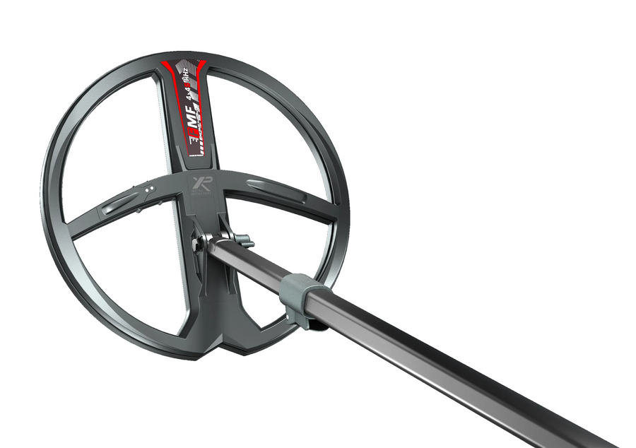 Deus FMF 11 inch coil attached to the detector rod on a white background
