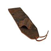 Close-up view of Serious Detecting brown leather sheath construction and stitching detail