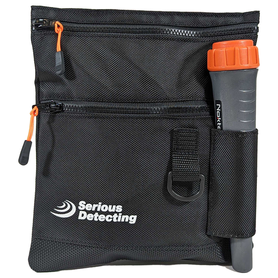 Serious Detecting black mesh bottom beach finds pouch with orange accents, dual zippered compartments, pinpointer holster, and adjustable waist belt