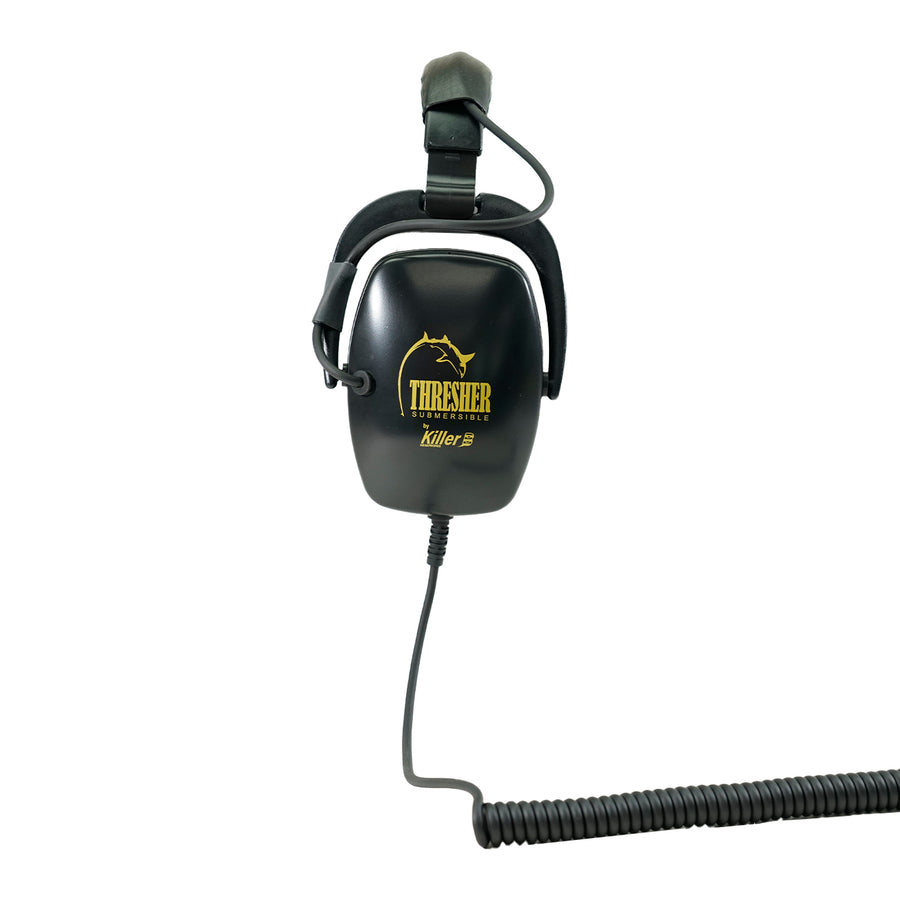 Black headphones positioned to the side with yellow "Killer B Thresher SUBMERSIBLE" writing in yellow with black coiled cord with white background