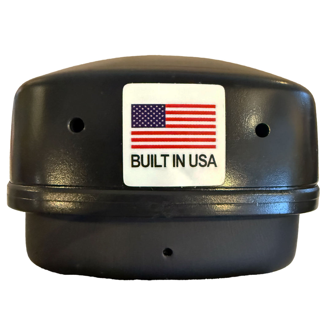 A black headphones bottom with a white sticker on the front featuring the American flag and the text 'BUILT IN USA'