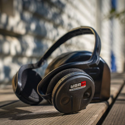 XP WSA ST wireless headphones folded in the included protective case