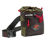 A green and black XP Metal Detectors Finds Pouch with red straps and a Molle attachment system, designed for carrying metal detecting equipment.